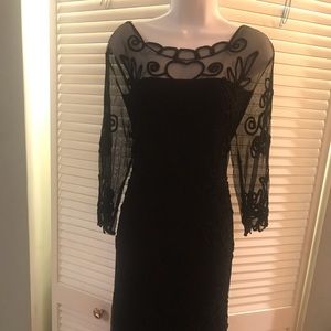 Black cotton long sleeved dress with sheer top